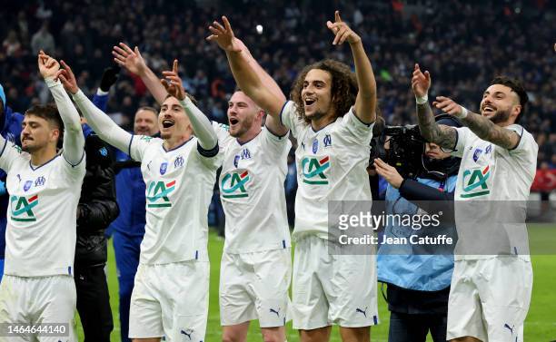 Valentin Rongier, Jordan Veretout, Matteo Guendouzi, Jonathan Clauss of Marseille celebrate the victory following the French Cup football match...