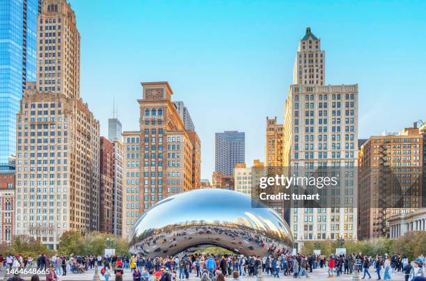 chicago cityscape and people around cloud gate sculpture in millennium - chicago bean stock pictures, royalty-free photos & images