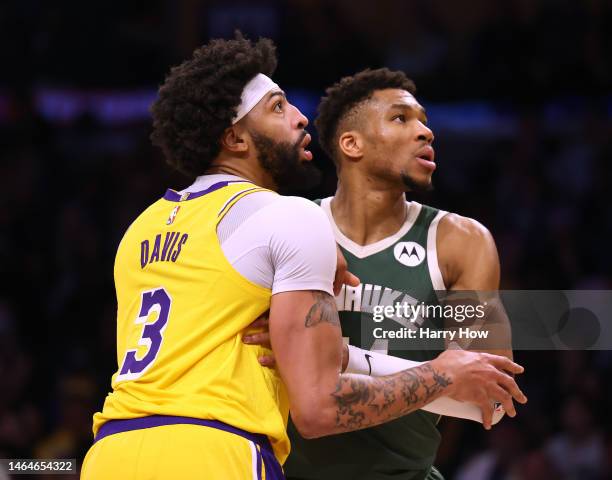 Giannis Antetokounmpo of the Milwaukee Bucks and Anthony Davis of the Los Angeles Lakers look for a rebound during a 115-106 Bucks win at Crypto.com...