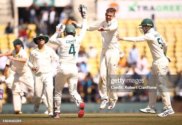 Todd Murphy of Australia celebrates taking the wicket of Virat Kohli of India during day two of the First Test match in the series between India and...