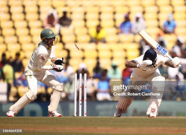 Suryakumar Yadav of India is bowled by Nathan Lyon of Australia during day two of the First Test match in the series between India and Australia at...
