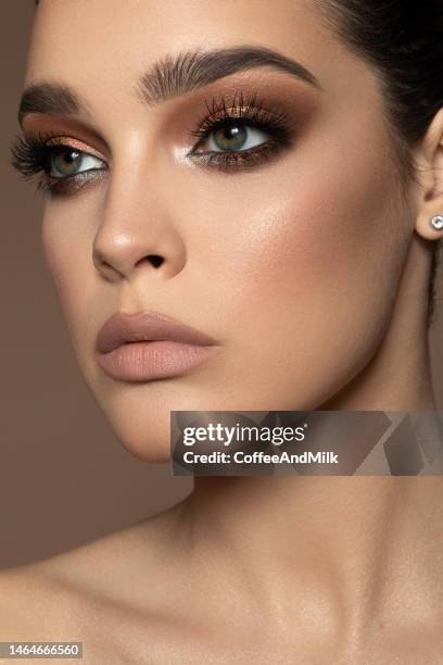 young woman with perfect skin and make-up - beautiful woman and eyeshadow stock pictures, royalty-free photos & images