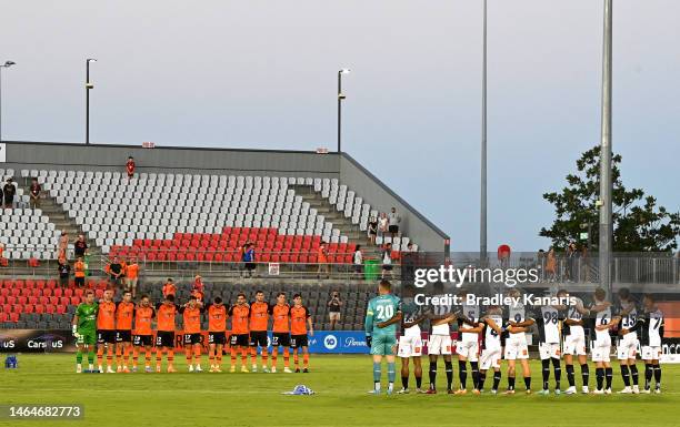 Players are seen taking a moments silence in memory to those who lost their lives in the recent earthquakes in Turkey and Syria before the round 16...