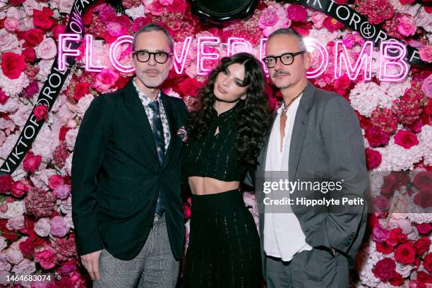 Fashion designers Viktor Horsting and Rolf Snoeren , and a guest attend the Viktor and Rolf Flowerbomb Party at Jean's in the East Village on...