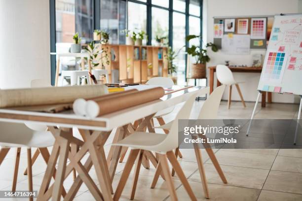 creative, boardroom and advertising agency office with furniture for team meeting or planning. company, creativity and modern minimal interior design with a artistic coworking space in the workplace. - agency creative stockfoto's en -beelden