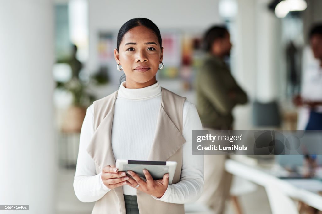 Creative woman, tablet and portrait of confident manager, leader or designer at corporate workshop. Female employee in leadership or management looking in confidence with touchscreen for startup