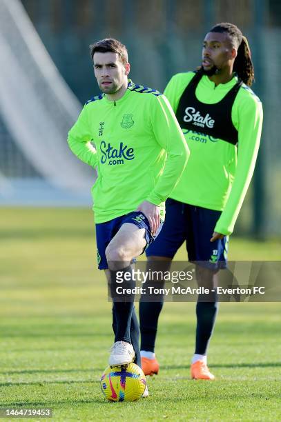 Seamus Coleman and Alex Iwobi during the Everton Training Session at Finch Farm on February 08, 2023 in Halewood, England.
