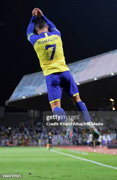 Cristiano Ronaldo of Al Nassr celebrates after scoring during the Saudi Pro League match between Al-Wehda and Al Nassr at King Abdul Aziz Stadium on...