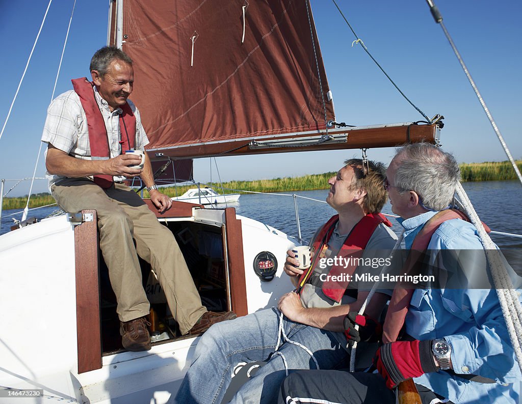 Mature Males Relaxing on Yacht