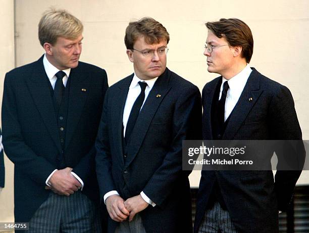 The three sons of Prince Claus of The Netherlands, Prince Constantijn, Prince Johan Friso and Crown Prince Willem Alexander watch the coffin...