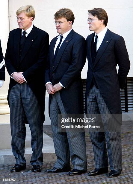 The three sons of Prince Claus of The Netherlands, Prince Constantijn, Prince Johan Friso and Crown Prince Willem Alexander watch the coffin...