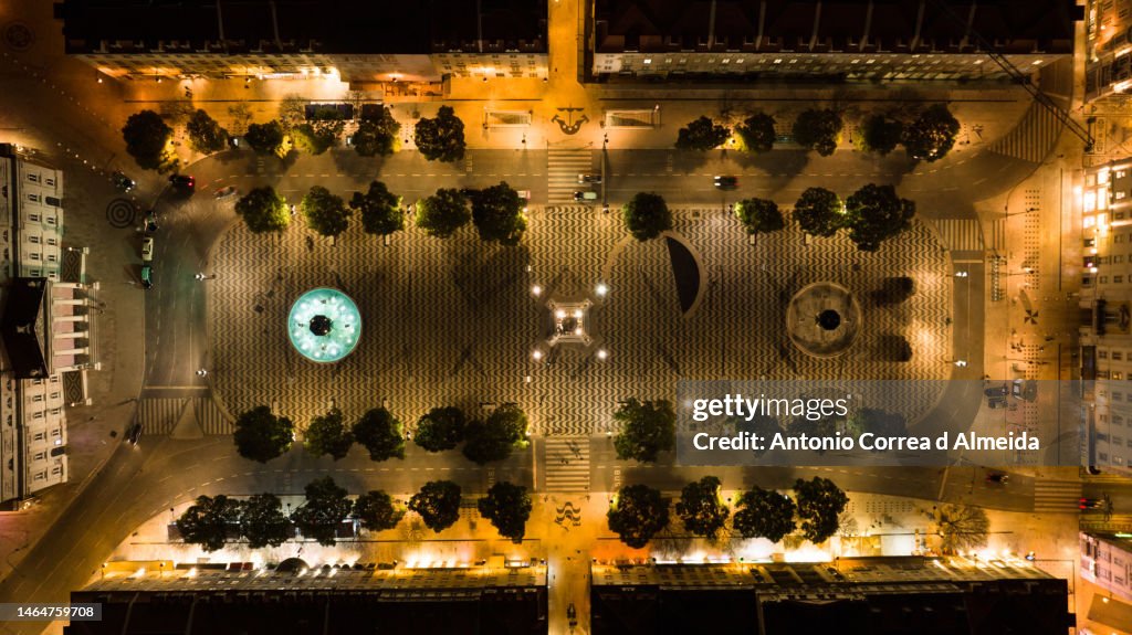 Aerial view of Pedro IV Square or Rossio Square in the city of Lisbon, Portugal, at night