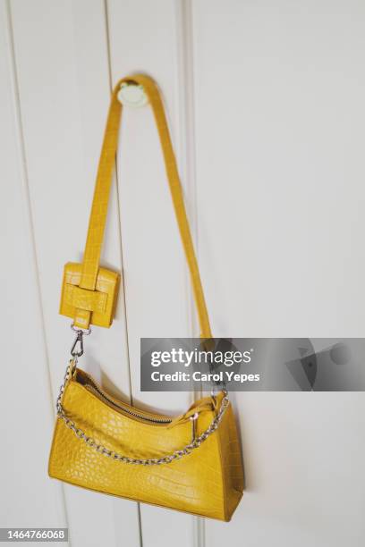 yellow female  handbag - moda magazine party stock pictures, royalty-free photos & images