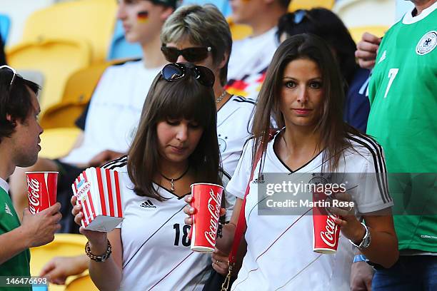 Silvia Meichel, girlfriend of Mario Gomez and Jessica Farber, girlfriend of Toni Kroos look on prior to the UEFA EURO 2012 group B match between...