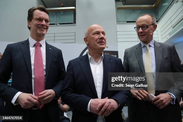 Kai Wegner , lead candidate of the German Christian Democrats in Berlin state elections, is flanked by CDU head Friedrich Merz and North...