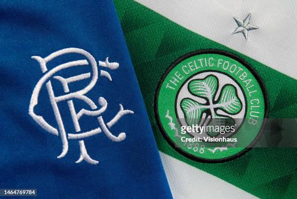 The Glasgow Celtic FC club badge with the Glasgow Rangers FC club badge on February 6, 2023 in Manchester, United Kingdom.