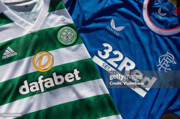 The logos of sports betting sites Dafabet and 32Red displayed on the official Glasgow Celtic FC and Glasgow Rangers home shirts on February 6, 2023...