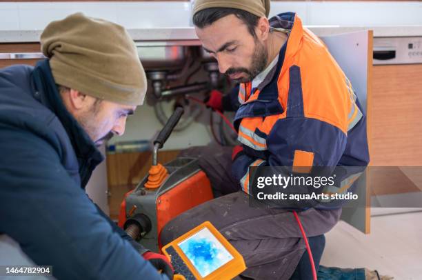 kitchen sink pipe inspection with camera - riool stockfoto's en -beelden