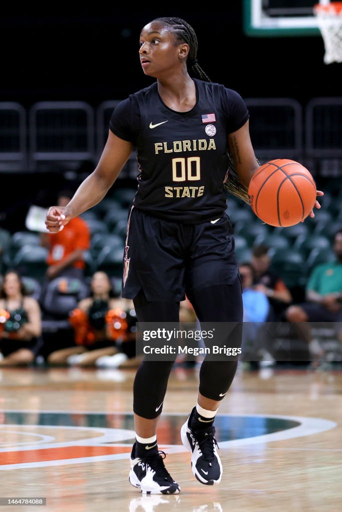 Ta'Niya Latson of the Florida State Seminoles in action against the ...