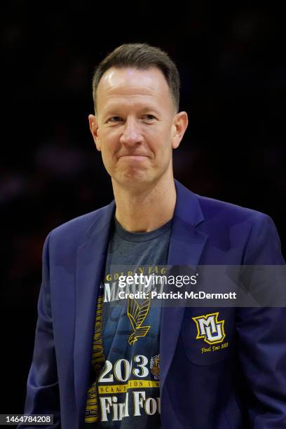 Former NBA and Marquette Golden Eagles player Steve Novak reacts during a half time ceremony to honor the 2003 Final Four Marquette team at the game...