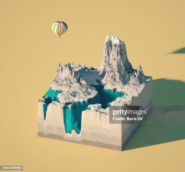 hot air balloon above the rocky island - ocean cross section stock pictures, royalty-free photos & images