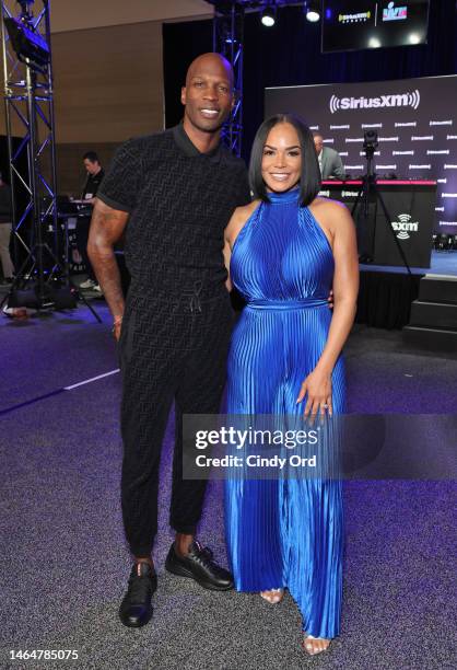 Chad "Ochocinco" Johnson and Evelyn Lozada attend SiriusXM At Super Bowl LVII on February 10, 2023 in Phoenix, Arizona.