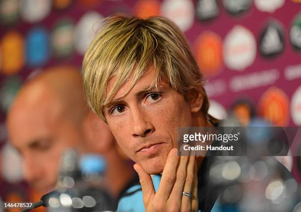 In this handout image provided by UEFA, Fernando Torres of Spain talks to the media during a UEFA EURO 2012 press conference at the Municipal Stadium...