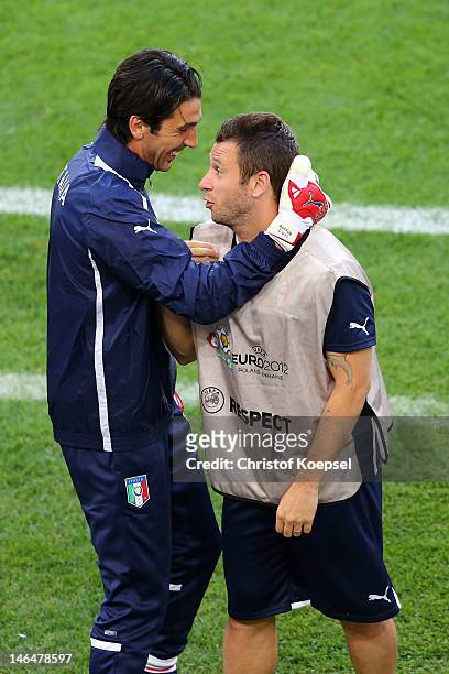 Gianluigi Buffon and Antonio Cassano of Italy make nonsense during a UEFA EURO 2012 training session at the Municipal Stadium on June 17, 2012 in...