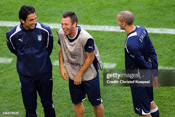 Gianluigi Buffon, Antonio Cassano and Leonardo Bonucci of Italy make nonsense during a UEFA EURO 2012 training session at the Municipal Stadium on...