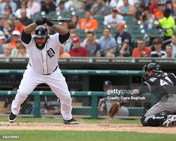 Prince Fielder of the Detroit Tigers is hit by a pitch during a MLB interleague game against the Colorado Rockies at Comerica Park on June 17, 2012...