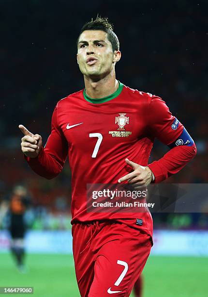 Cristiano Ronaldo of Portugal celebrates scoring his team's first goal during the UEFA EURO 2012 group B match between Portugal and Netherlands at...