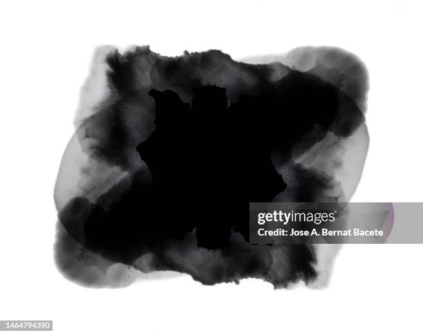 drop of black paint sliding on a white background. - black watercolor stockfoto's en -beelden