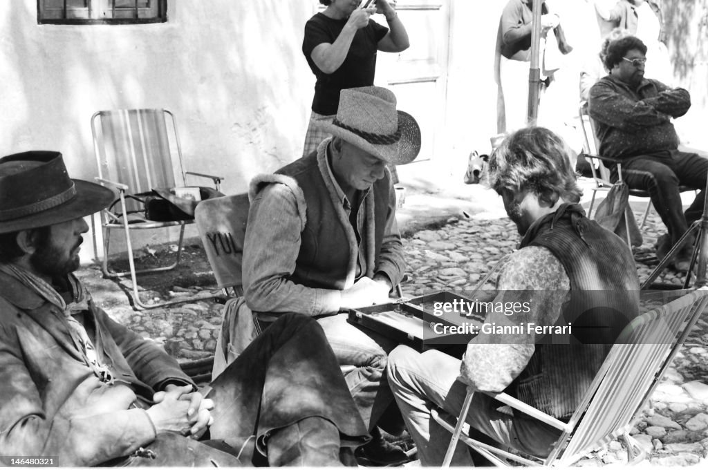 Catlow American actor Yul Brynner playing backgammon during a break from ...