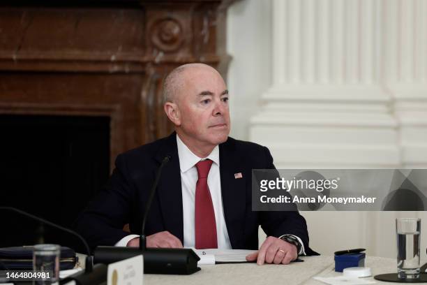 Department of Homeland Security Secretary Alejandro Mayorkas listens as U.S. President Joe Biden speaks during a meeting with governors visiting from...