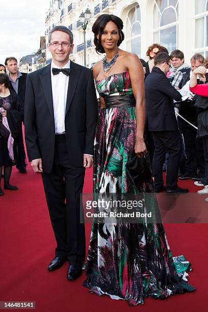 Thales Angenieux CEO Pierre Andurand and Angenieux's model Linda Carriel attends the 26th Cabourg Romantic Film Festival on June 16, 2012 in Cabourg,...