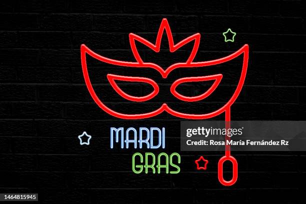 mardi gras neon sign.  retro neon banner on wall background - mardi gras banner stock pictures, royalty-free photos & images