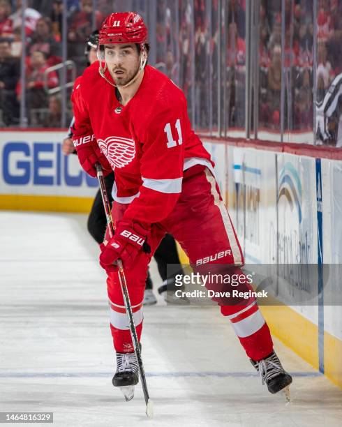 Filip Zadina of the Detroit Red Wings follows the play against the Calgary Flames during the second period of an NHL game at Little Caesars Arena on...