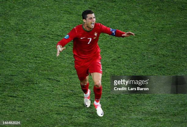 Cristiano Ronaldo of Portugal celebrates scoring his team's second goal during the UEFA EURO 2012 group B match between Portugal and Netherlands at...