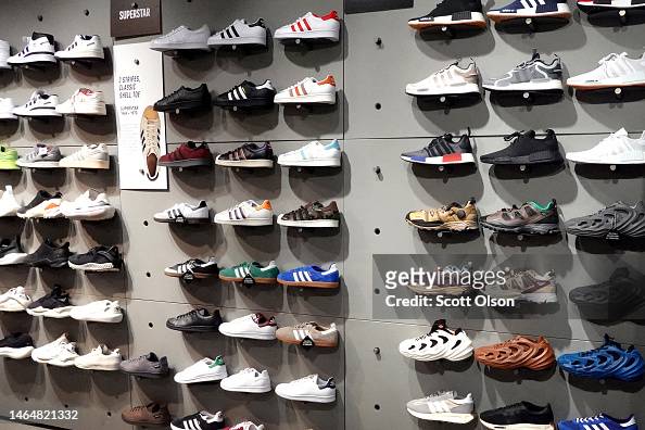 Shoes are offered for sale at an Adidas store on February 10, 2023 in ...