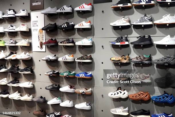 Shoes are offered for sale at an Adidas store on February 10, 2023 in Chicago, Illinois. Adidas is expecting to report a loss in 2023 after...