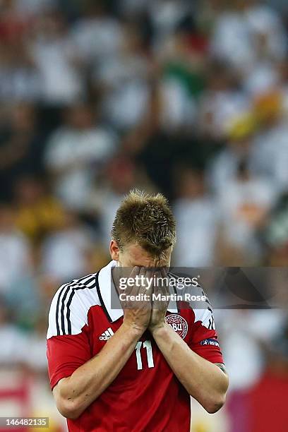 Nicklas Bendtner of Denmark puts his head in his hands after the UEFA EURO 2012 group B match between Denmark and Germany at Arena Lviv on June 17,...