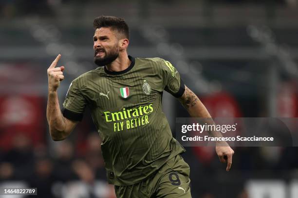 Olivier Giroud of AC Milan celebrates after scoring his side's first goal of the match during the Serie A match between AC Milan and Torino FC at...