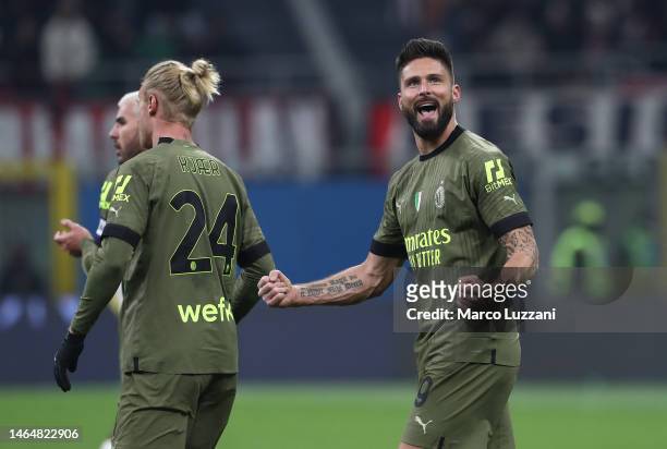 Olivier Giroud of AC Milan celebrates scoring his goal during the Serie A match between AC MIlan and Torino FC at Stadio Giuseppe Meazza on February...