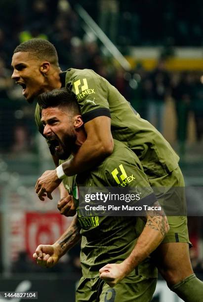 Olivier Giroud and Malick Thiaw of AC Milan celebrate after scoring their team's first goal during the Serie A match between AC MIlan and Torino FC...