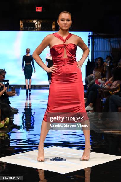 Model walks the runway wearing Camellia Couture during NYFW hiTechMODA Season 9 at Gotham Hall on February 10, 2023 in New York City.