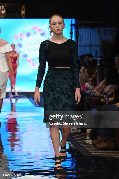 Model walks the runway wearing Camellia Couture during NYFW hiTechMODA Season 9 at Gotham Hall on February 10, 2023 in New York City.