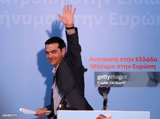 Alexis Tzipras, the leader of the Syriza party, leaves a press conference in his party's offices following an expected second place in the general...