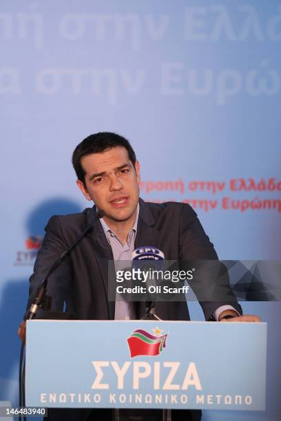 Alexis Tsipras, the leader of the Syriza party, speaks during a press conference in his party's offices following an expected second place in the...
