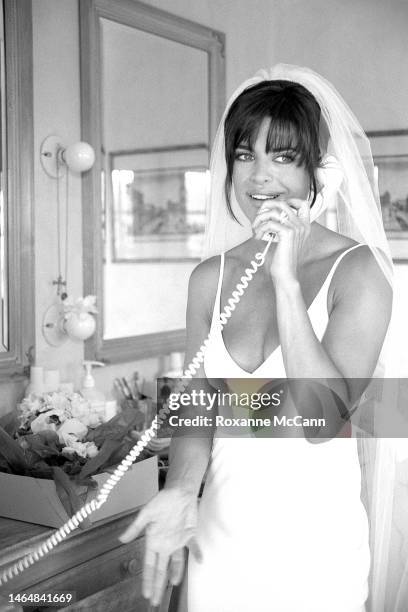 Actress Lisa Rinna takes a phone call in her dressing room at home on March 29, 1997 in Beverly Hills, California.