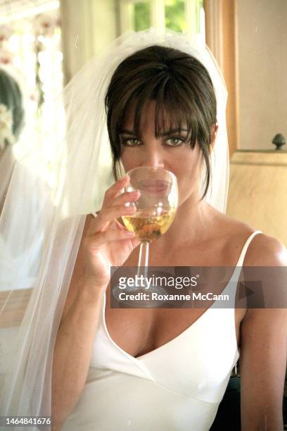 Actress Lisa Rinna sips Dom Perignon in her dressing room on March 29, 1997 in Beverly Hills, California.